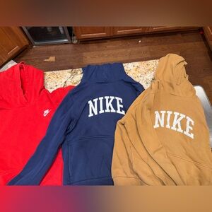 Nike Boy’s Size XL Red, Blue, and Tan Sweaters